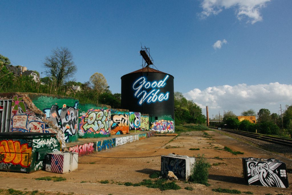 spray paint murals and good vibes sign in asheville, NC